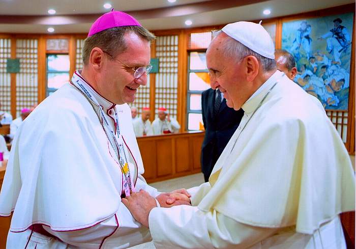 Bishop Olivier Schmitthaeusler and Pope Francis